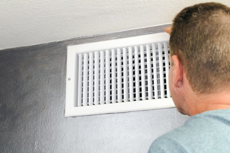 Man checking the AC system
